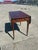 This is a stunning antique Pembroke drop-leaf end table, exhibiting classic Federal or Sheraton design characteristics....