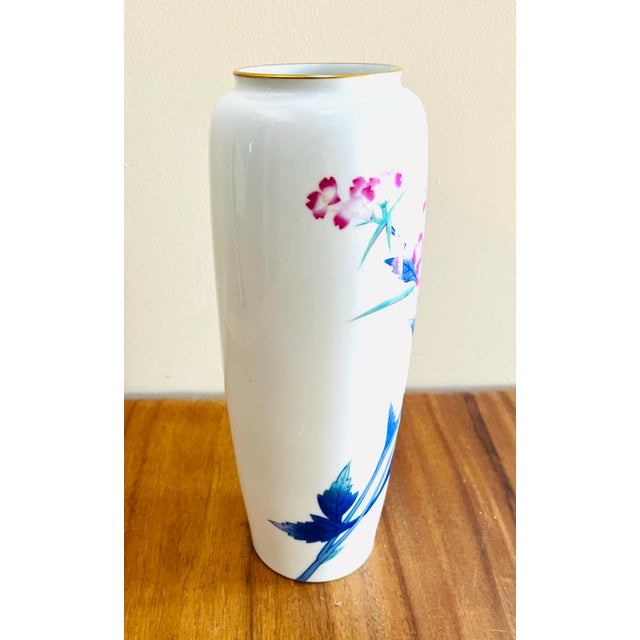 Beautiful white porcelain Japanese vase Handpainted pink and blue floral decoration 12” H x 4” D Gold rim Works in both a...