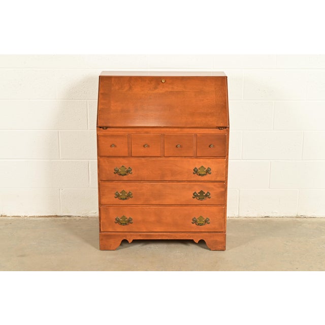 A beautiful American Colonial or Chippendale style bureau with drop front secretary desk By Ethan Allen USA, Circa 1970s...