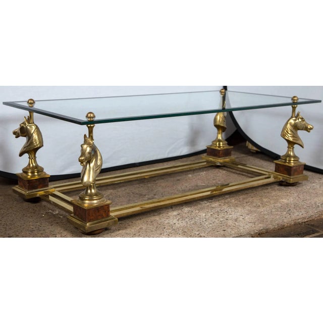 French bronze horse head glass top coffee table by Maison Charles circa 1970.