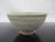 Chinese Southern Song Yuan style celadon glazed bowl. Small footed bowl with thick, pale blue green glaze and rounded...
