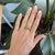 An intricately woven basket-weave design gives this solid 14K yellow gold estate ring texture and depth, catching the...