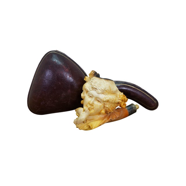 Antique carved meerschaum pipe featuring a detailed female figure kissing a bird and sterling silver collar. Includes...
