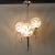 This chandelier was designed by Gaetano Sciolari for Sciolari, in Italy, during the 1970's. The structure is in chromed...