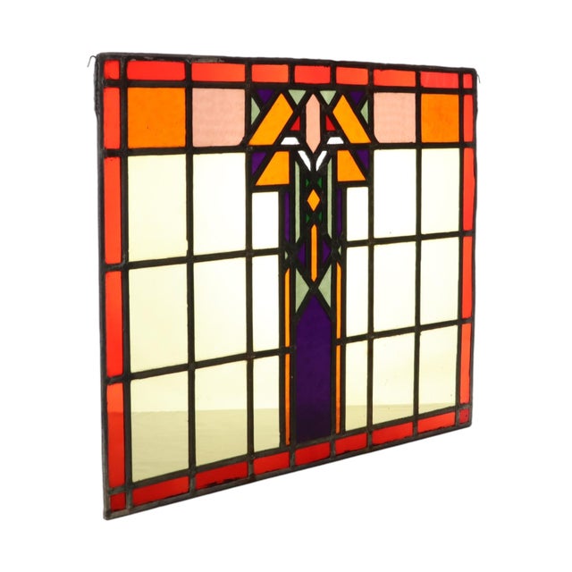Colorful Amsterdam School stained-glass window from the Art Deco period (first half of the 20th century, Netherlands). A...