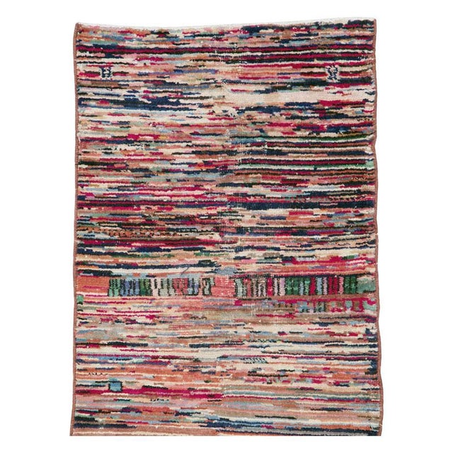 A vintage Turkish Anatolian tribal style small runner handmade during the mid-20th century. Measures: 2' 3" x 7' 10"