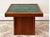 Striking vintage Brown-Saltman side table featuring a warm wood frame, architectural pedestal base, and dramatic deep...