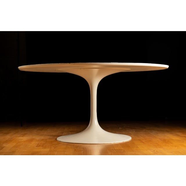 c. 1960s; (likely) Knoll Inc. - East Greenville, PA Circular Danish dining table with painted cast iron base and white...