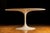 c. 1960s; (likely) Knoll Inc. - East Greenville, PA Circular Danish dining table with painted cast iron base and white...