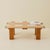 This striking Italian 1970s coffee table features a sculptural architectural wood base beneath a clear glass top. The...
