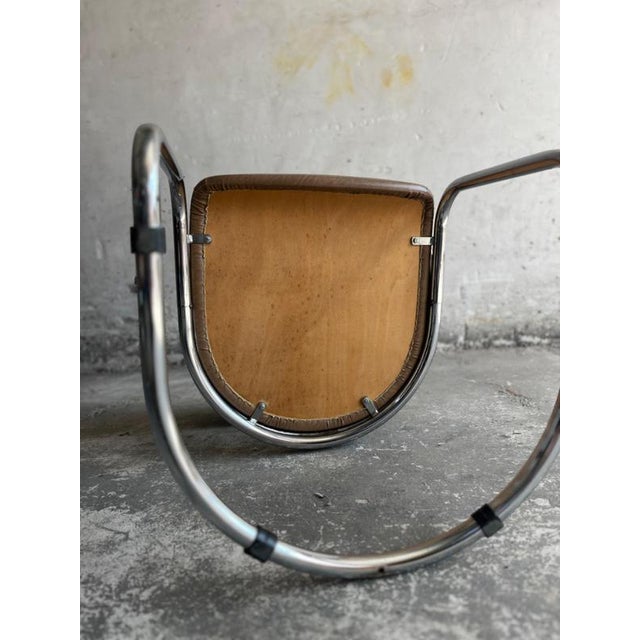 Height: 79 cm (31.10 inch) Width: 50 cm (19.69 inch) Depth: 54 cm (21.26 inch) Vintage armchair of the 70s, foot and...