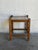 Turned legs support an inset ceramic tile surface in a compact, square frame. Raised post corners accentuate its sturdy...