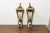 A pair of French gilt iron wall mounted lanterns from the mid 20th century, with single lights and acorn style finials....
