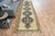 Vintage Hand-Knotted runner rug is a semi-antique vintage runner rug. The '70s Eastern region of Anatolia's unique rug is...