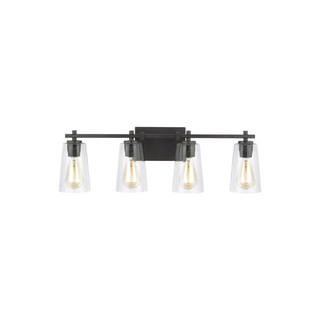 The Sean Lavin Mercer four light vanity fixture in oil rubbed bronze offers shadow-free lighting in your powder room, spa,...