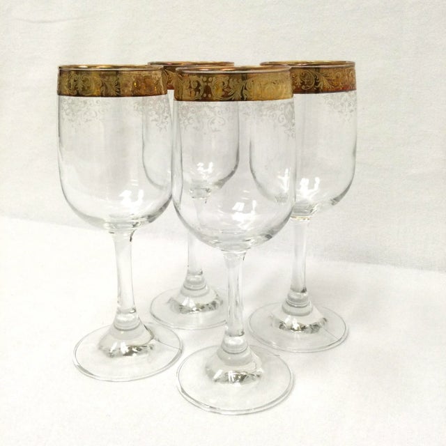 Vintage Cellini Italian crystal stemware. Beautifully etched crystal wine glasses with a rim of 22k gold.
