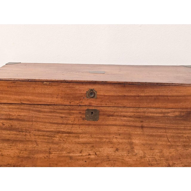 A Chinese camphor brass-mounted campaign trunk, circa 1890.
