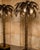 PAIR OF MAISON JANSEN PALM TREE FLOOR LAMPS France, circa 1970s Few lighting designs are as instantly recognizable as...