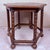 Charming Spanish hexagonal side table crafted from wood, featuring a distinctive geometric top with a subtly framed...