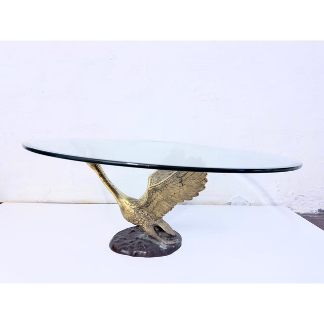 Coffee table from the 1970s/80s. Metal, removable round glass top with a beveled edge. Good used condition. Light patina....