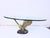 Coffee table from the 1970s/80s. Metal, removable round glass top with a beveled edge. Good used condition. Light patina....