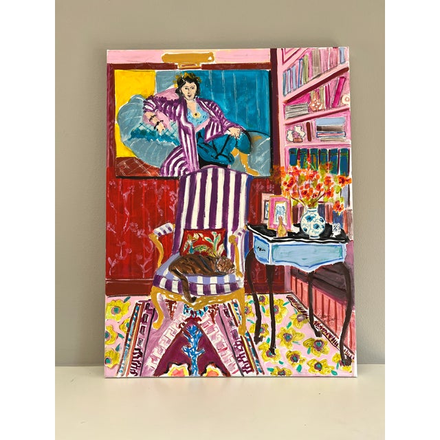 Henri Matisse's painting "Woman in a Purple Robe" circa 1937 is the focal point of this interior painting. A cozy corner...