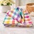 A cheerful set of 10 vintage linen napkins in a vibrant multicolor plaid, featuring classic mid-century hues of citrus...