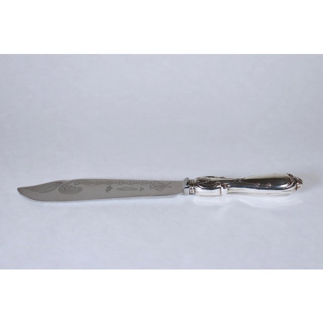 Ambassador Cutlery Mfg. & Company Sheffield England Sterling Silver Handle Fish knife. The knife has a beautiful, embossed...