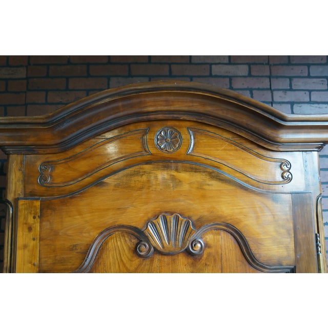 Capturing the grace of 18th century France this bonnetiere is rustic, elegant and charming. Carefully crafted this armoire...