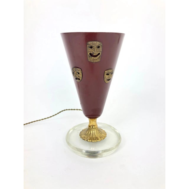 This table lamp represents the Comedy and Tragedy masks, made of brass on a surface of steel, and stands on a massive...