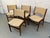 Exceptional set of four vintage Danish Modern Erik Buch "Model 89" dining chairs, an iconic mid-century design celebrated...