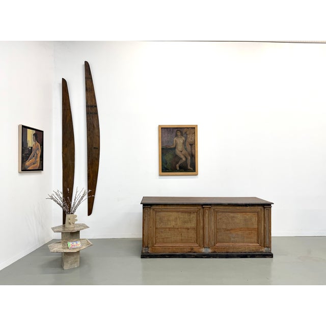 An authentic piece of trade furniture that tells a story. This large shop counter, dating from the 1920s, is made of solid...