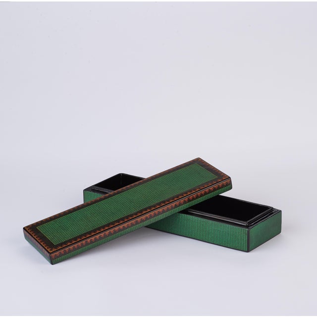 Handsome and useful, this singular box makes a statement with its eye-catching, green contemporary design. Its all-over...