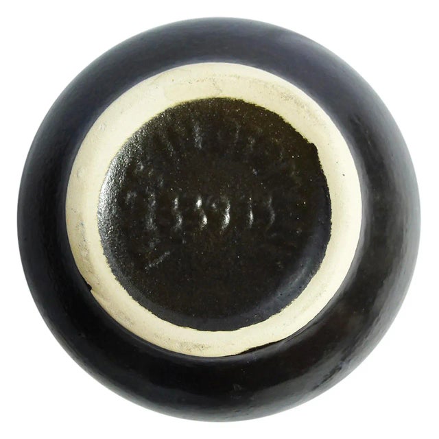 Red Modernist vase in a bright red glaze with black Lava glaze pattern. Marked 339-15 W. Germany. In excellent condition....