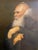 Signed oil on canvas painting featuring the portrait of an elderly bearded man with cane in hand. Possibly signed lower...
