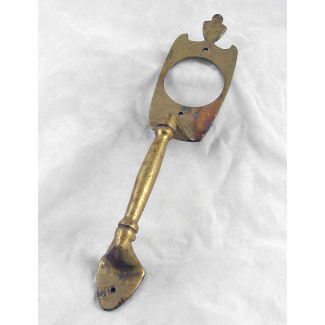 Polished brass finish vintage pull with a cylinder lock insert. One available. The manufacturer and exact date of creation...