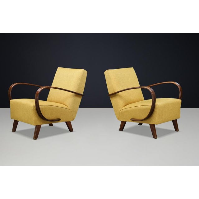 Pair of Jindřich Halabala Sculptural Bentwood Lounge Chairs, Czechoslovakia, 1940s A striking pair of sculptural lounge...