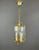 Refined pendant light, embodying the elegance and grace of the Louis XVI style. Crafted from finely worked bronze, this...
