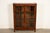 A beautiful antique Mission or Arts & Crafts period glass front two door bookcase or display cabinet In the manner of...