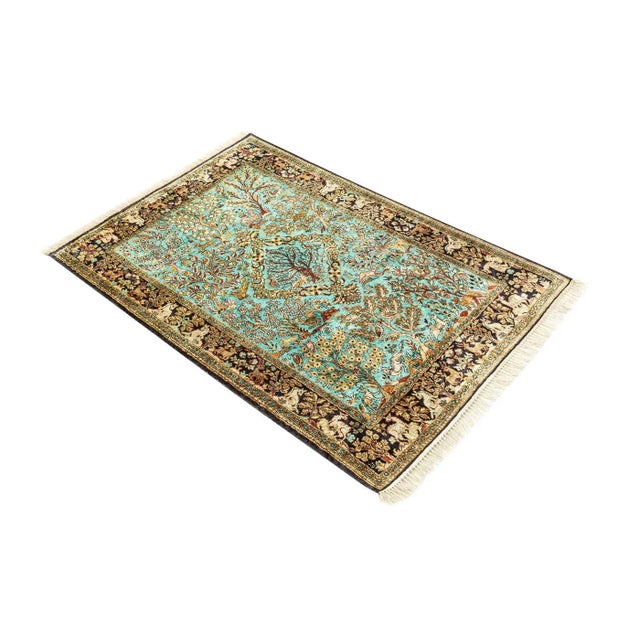 Rug from the 1960s. Wonderful, silky shimmering flor in turquoise with accents in beige and brown tones. Characteristics:...