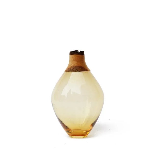 Amber matisse stacking vessel iii, pia wüstenberg dimensions: d 11 x h 21 materials: glass, wood the matisse stacking...
