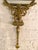 A rare and beautifully detailed 19th-century French vanity hand mirror, crafted in bronze with a warm gilded patina and...