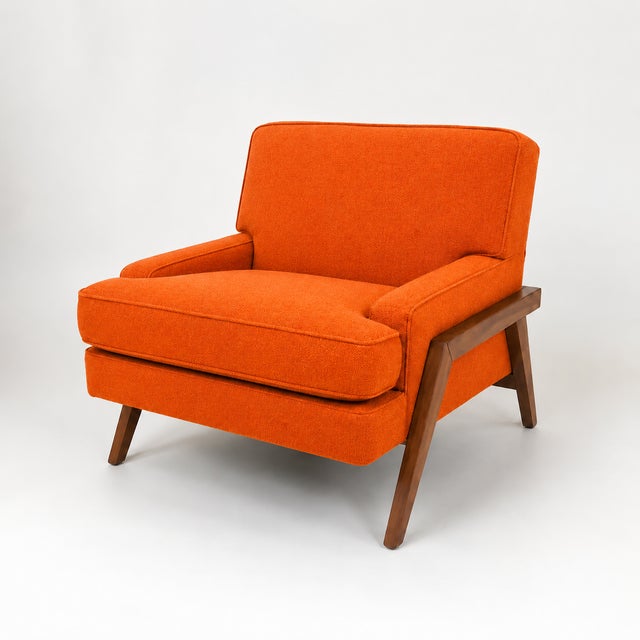 Mid century lounge chairs. Set was reupholstered for listing. Walnut wood trim was refinished. We used an orange chenille,...