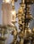 Five-arm bronze chandelier decorated with rams' heads. Very high-quality design from the 19th century. The chandelier is...
