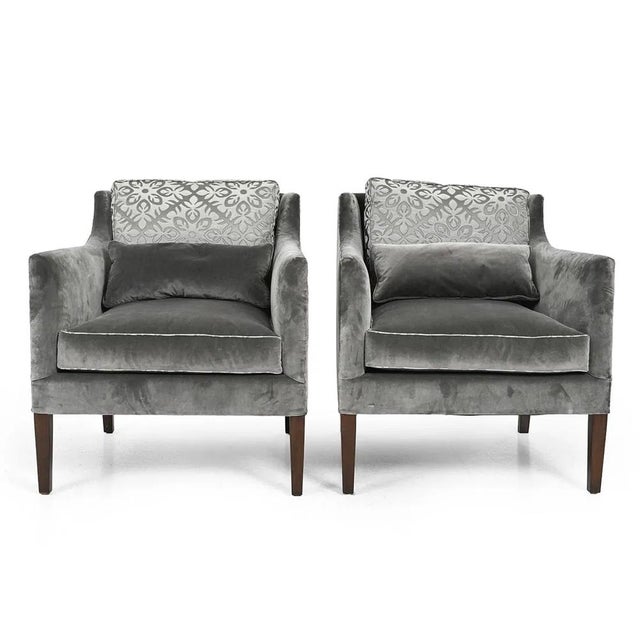 A pair of Rose Tarlow - Melrose House lounge chairs upholstered in a stunning steel gray upholstery. We could go on at...