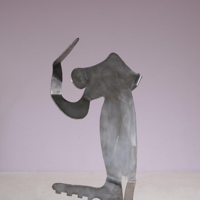 1990s abstract metal sculpture entitled Mensch mit Mensch, designed by Guido Hafner, Germany. This expressive sculptural...