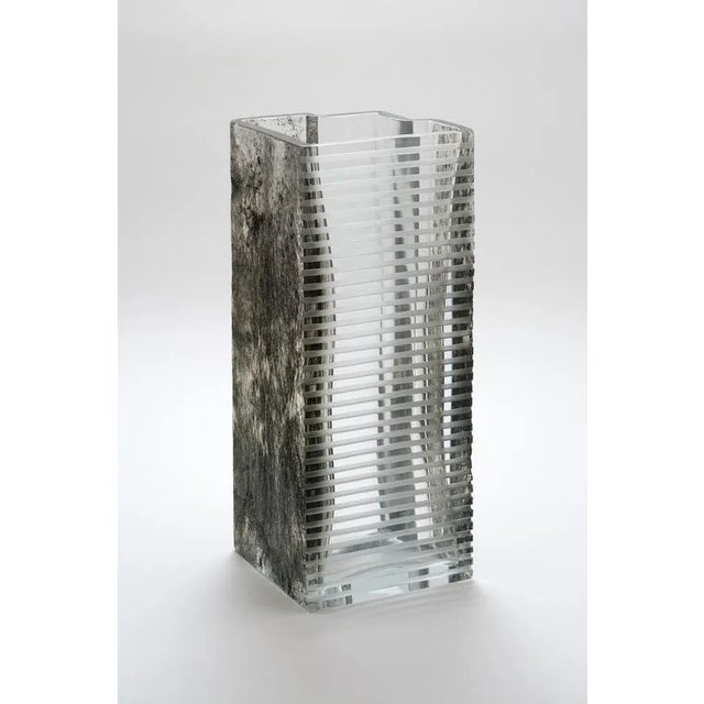 Beyond the dark forest vase by Paolo Marcolongo Dimensions: 42 x 16.3 x H 17 cm Materials: Murano glass and iron.