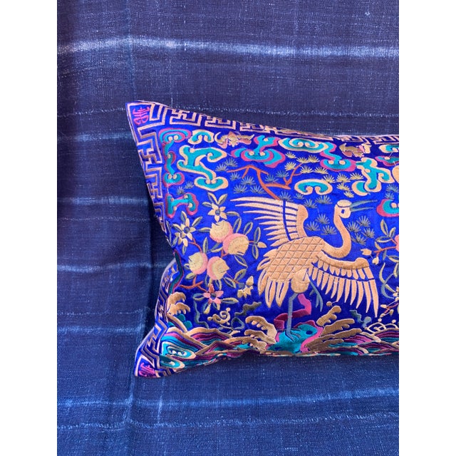 Boudoir lumbar pillow made of a vintage colorful embroidered silk Asian textile fragment from a Chinese Opera Robe. A...