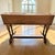 A striking and highly functional 19th-century Gothic Revival twin slant-lid desk, expertly crafted from solid quarter-sawn...