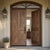 A striking pair of antique rustic wooden doors featuring an intricate geometric chevron pattern, meticulously hand-carved...